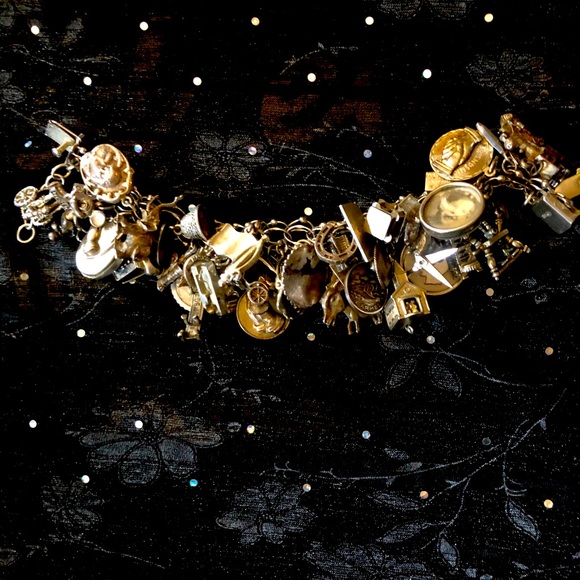 Jewelry - 1960s sterling silver 45 charm bracelet